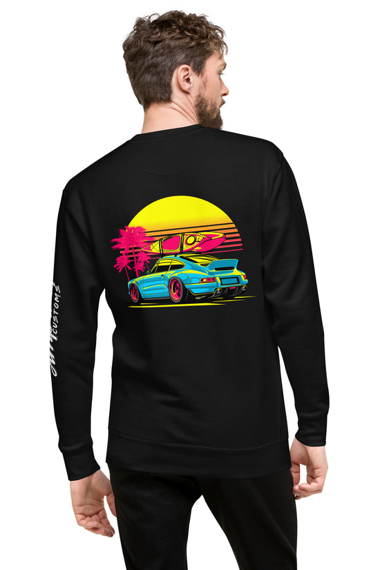 Black sweatshirt featuring a vibrant back illustration of a Sunset Porsche Sweatshirt with tropical palm trees