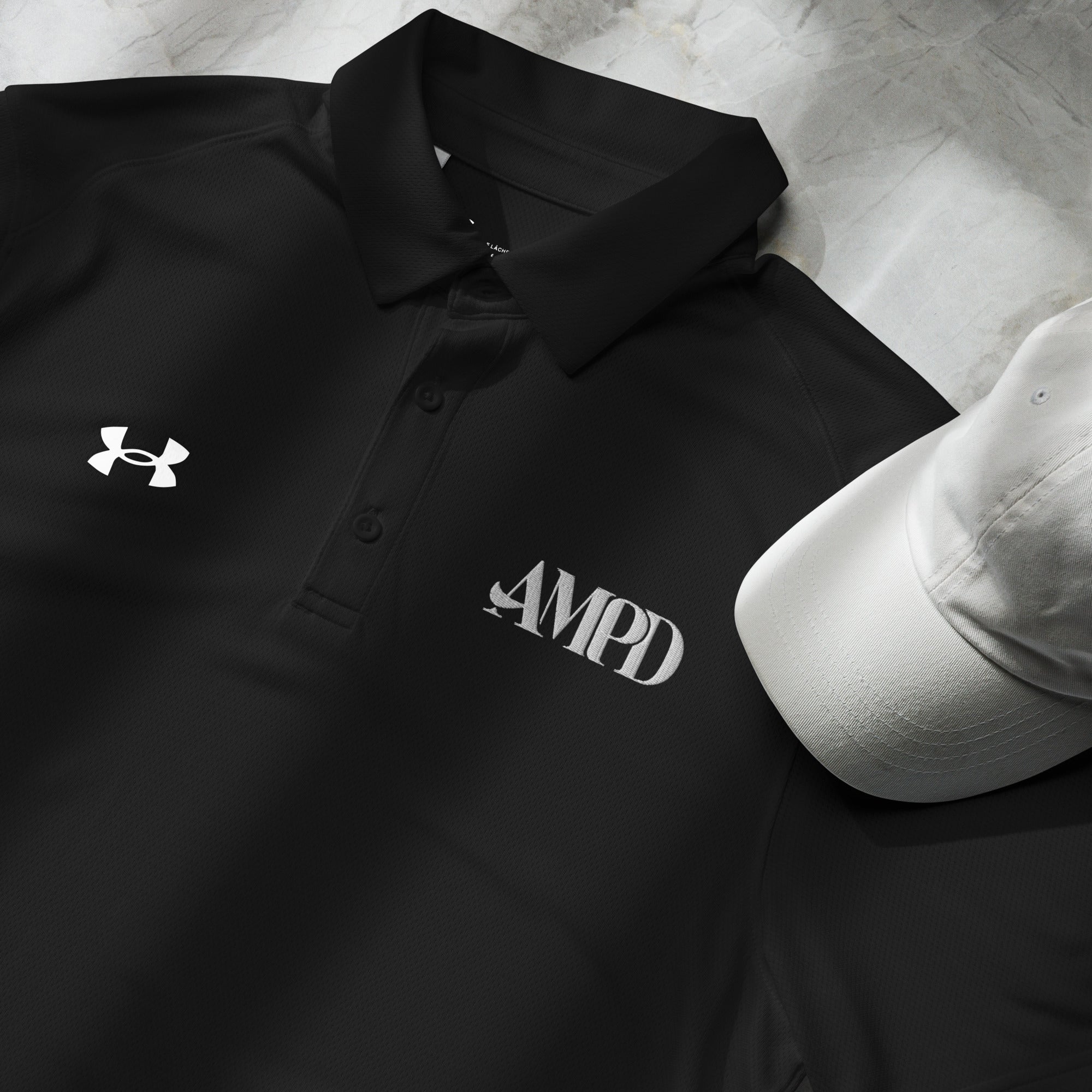 AMPD Official Under Armour® Men's Polo in Black with Logo and White Cap for a Stylish Look