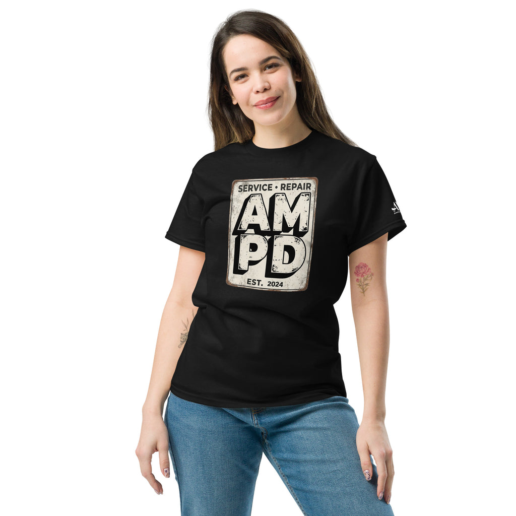 Woman wearing a black t-shirt with a colorful graphic design on a white background