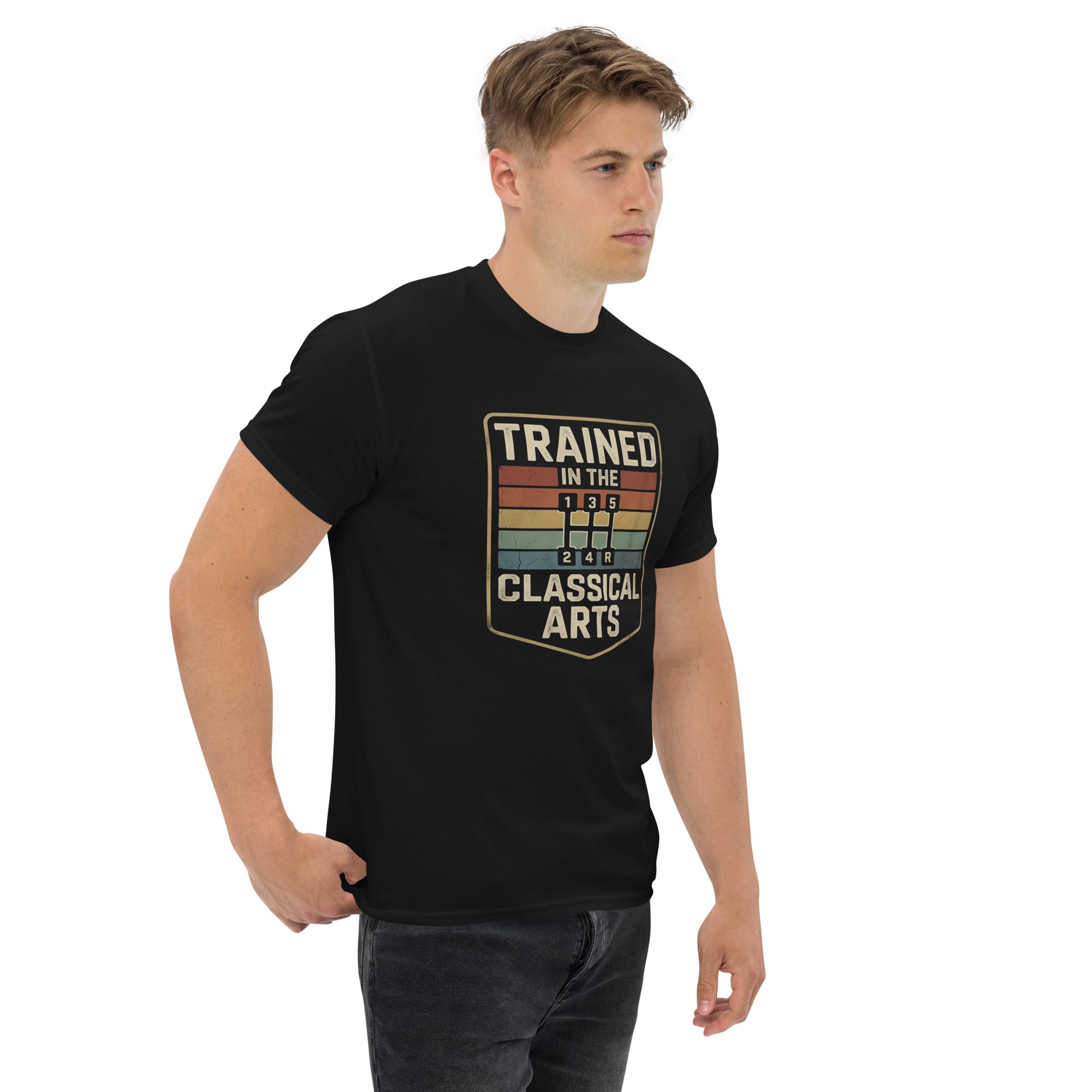 Man wearing a black t-shirt with a graphic design on a white background