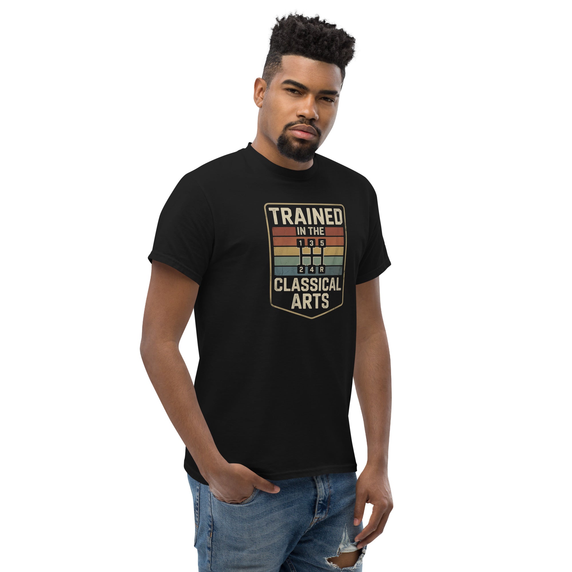 Man wearing a black t-shirt with a graphic design on a white background