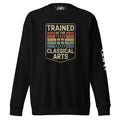 Black sweatshirt with 'Trained in the Classical Arts' graphic on a white background