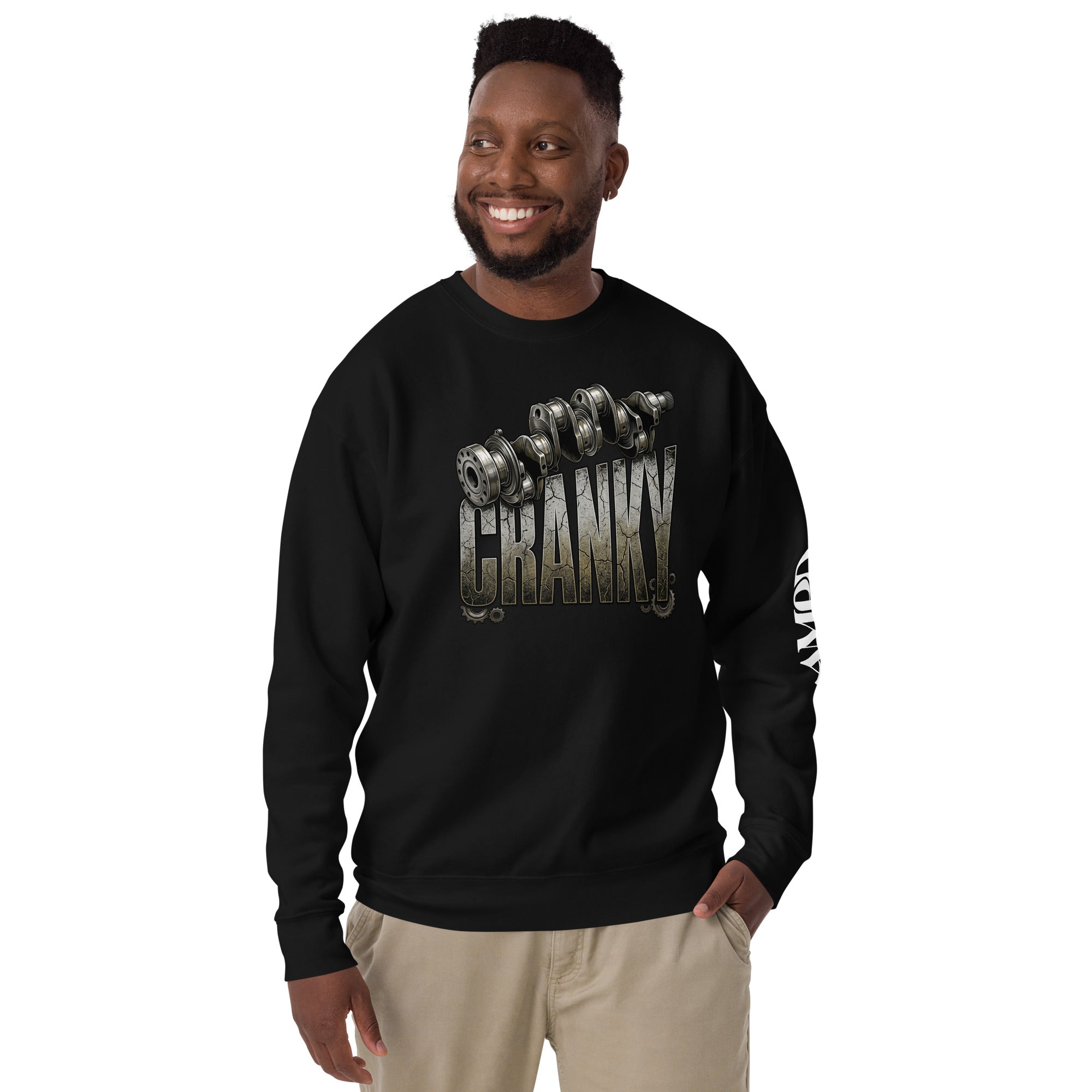 Man wearing a black sweatshirt with text, standing against a white background