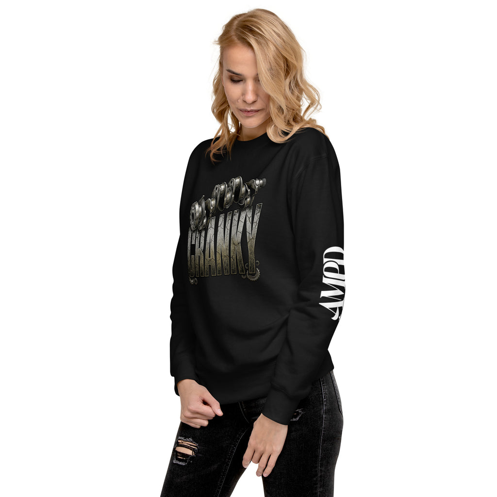 Woman wearing a black long-sleeve shirt with graphic design on a white background
