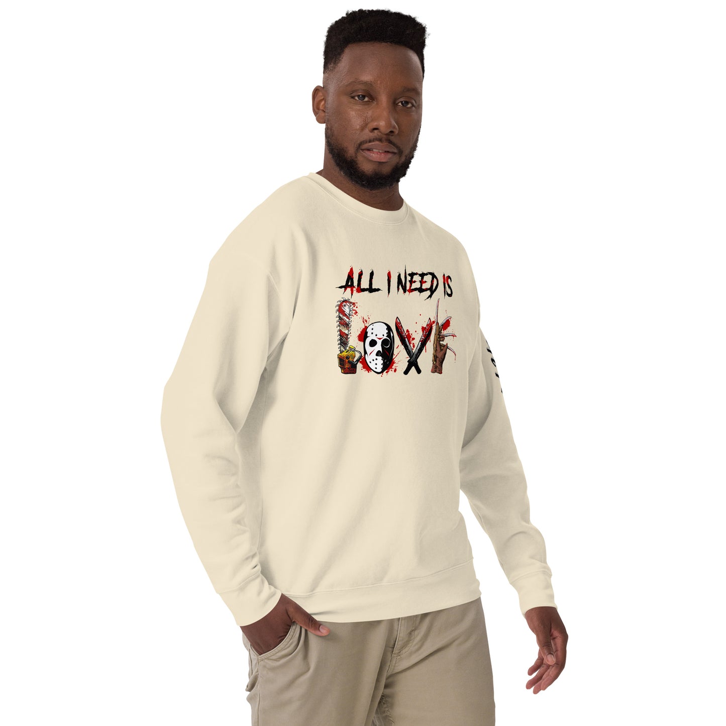 Man wearing a cream All I Need Is Love Sweatshirt by Amp'd Up Custom with graphic design