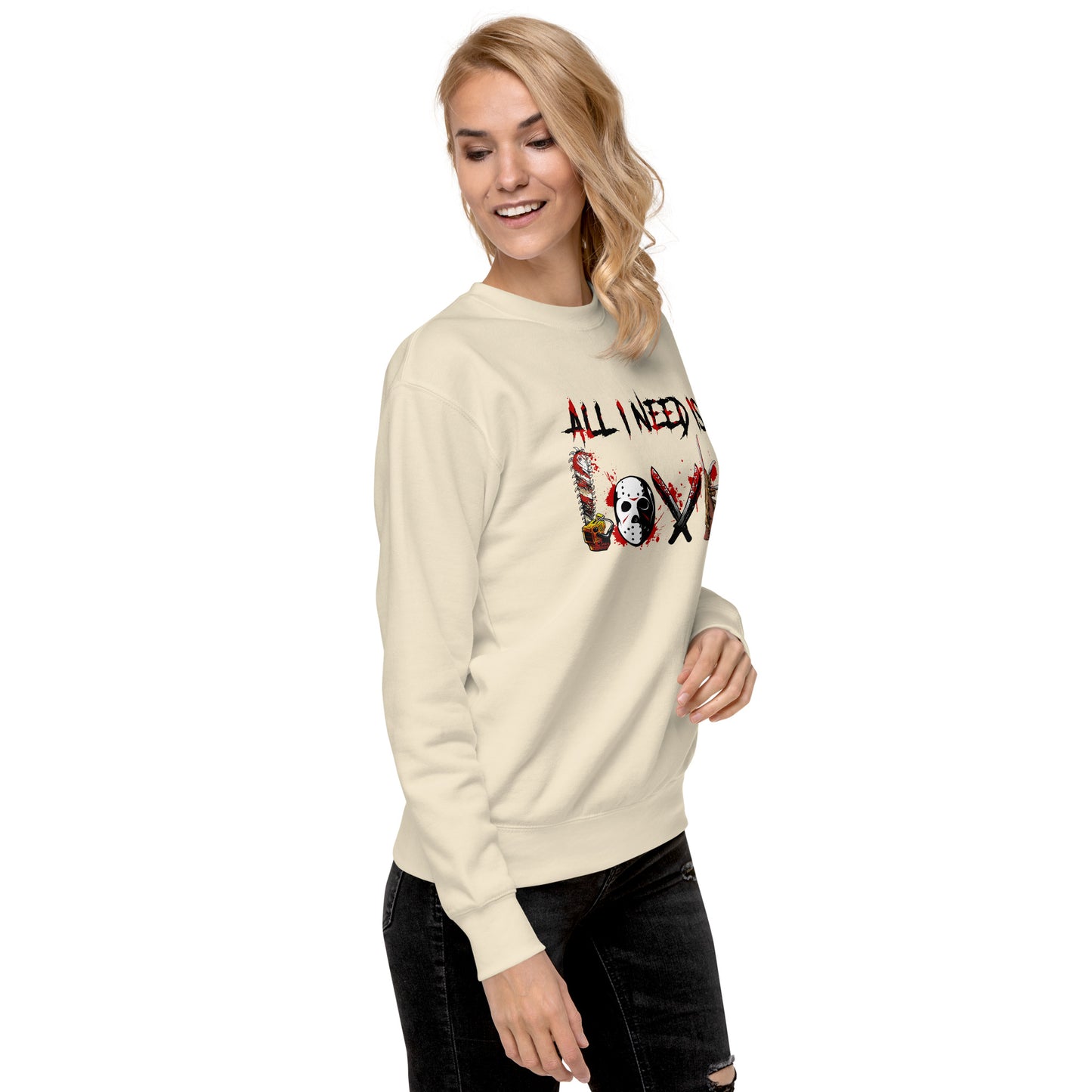 Woman wearing Amp'd Up Custom All I Need Is Love Sweatshirt in cream color with graphic design