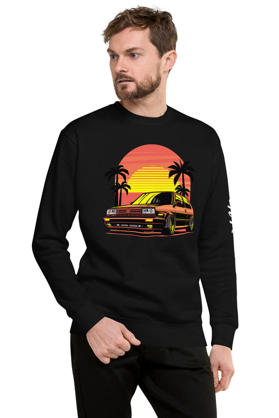 Stylish Sunset Volkswagen Sweatshirt featuring vibrant palm tree and car design on a black background