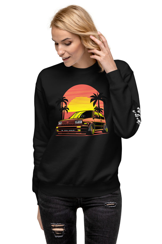 Sunset Volkswagen Sweatshirt featuring a vibrant graphic of a car with palm trees and sunset background